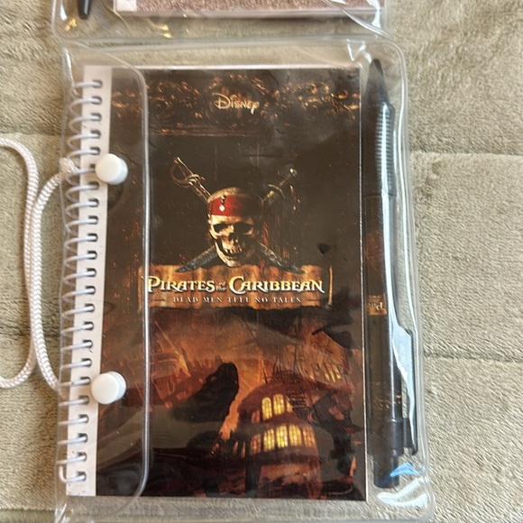 4 Small Disney Cars and Pirates of the Caribbean Notebook with matching pens. - Picture 3 of 5